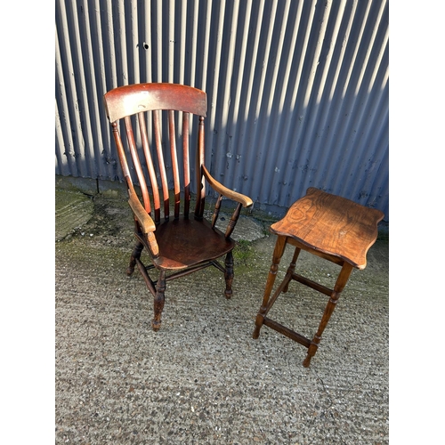 90 - A farmhouse style Windsor armchair together with an oak occasional table