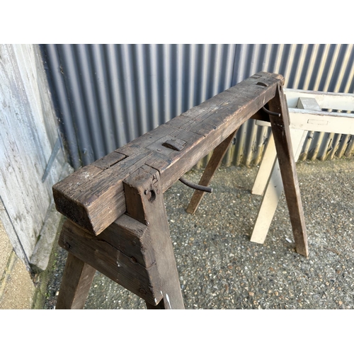 96 - A wooden A frame butchers sharpening stand together with  a white pine table base