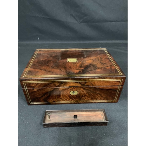 455 - Regency Mahogany brass inlaid writing slope, with two inkwells and removable pen tray, paper label E... 