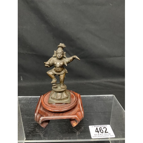 462 - Oriental Bronze on wooden plinth, overall height 14cms