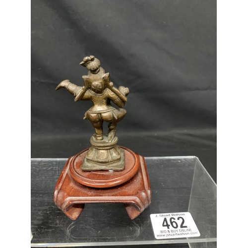 462 - Oriental Bronze on wooden plinth, overall height 14cms