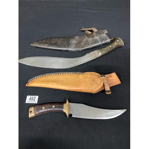 492 - 2 knives with leather sheaths