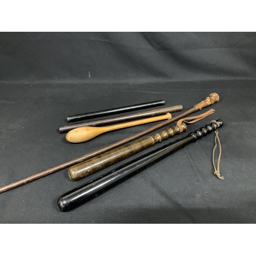 498 - Carved head walking stick, 2 Truncheons, longest 56cms and 3 wooden instruments