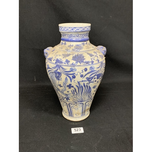 523 - Oriental blue and white fish vase, height 33cms