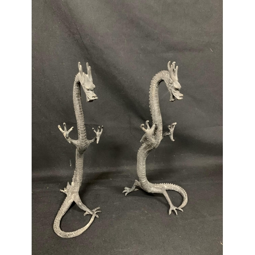 525 - Pair of bronze dragon figures, height 41cms