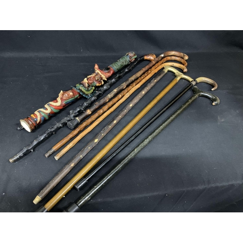 557 - Rain maker a/f and 8 walking sticks