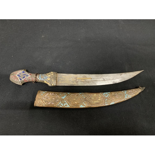 576 - Eastern style metal dagger and sheath, length 43cms