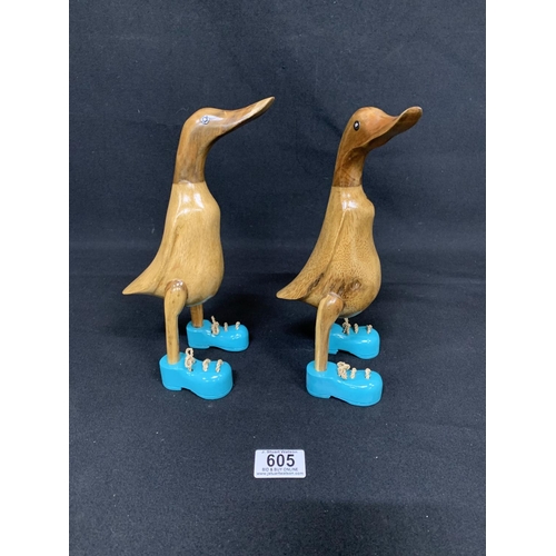 605 - Pair comical wooden ducks, height 25cms