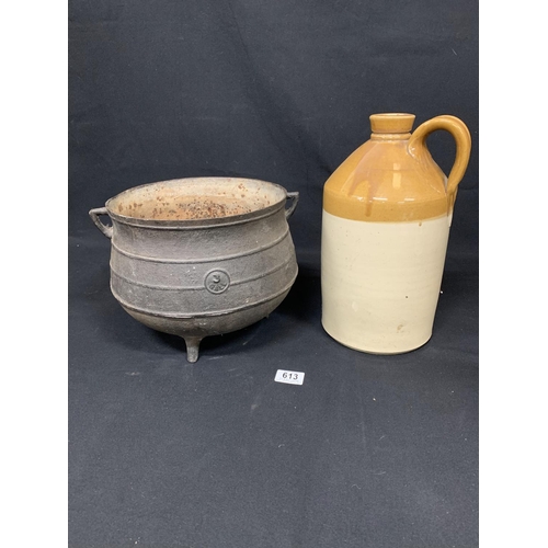 613 - Iron 3 gallon cauldron, 23cms high, 25cms wide and stone flagon