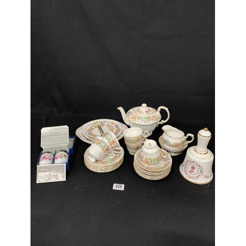 629 - Paragon Country Lane Teaware, with cake stand, Commemorative bell and egg codlers