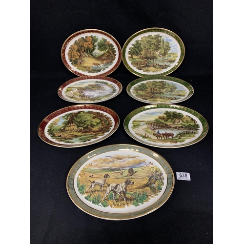 635 - 7 Falconware oval plates with country scenes, each length 30cms