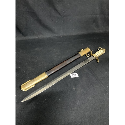 723 - Naval Dirk in scabbard, length 63 cms