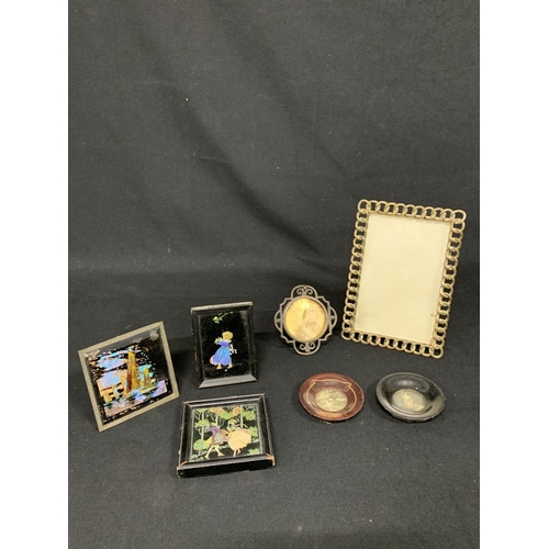 734 - Two Victorian brass frames, two miniature circular wooden frames, three butterfly wing miniatures