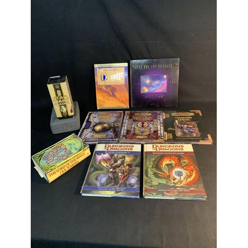 877 - Dungeon & Dragons handbooks, other books and Star Wars Trilogy Video