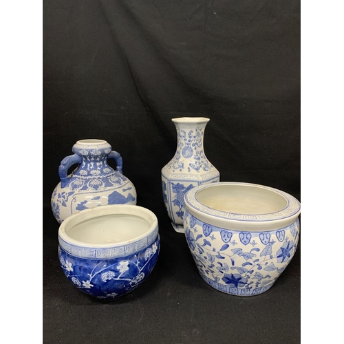 882 - Four pieces of blue and white patterned vases & Jardinieres, tallest vase  37 cms