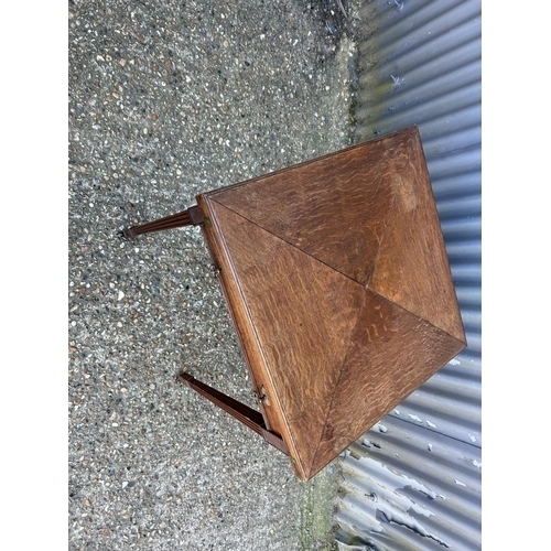60 - An Edwardian oak envelope card table with drawer 60x60x74