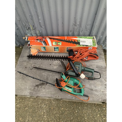 422 - Three Electric hedge cutters