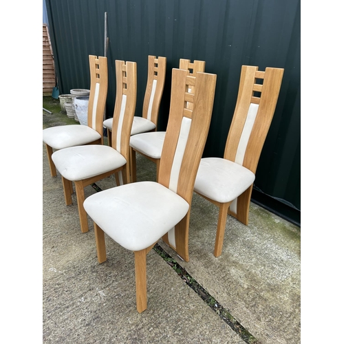 226 - A set of six modern light oak and white leather dining chairs