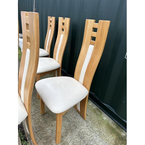 226 - A set of six modern light oak and white leather dining chairs