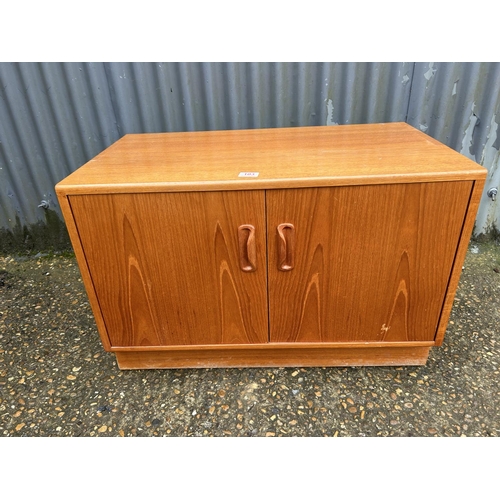 103 - A g plan teak two door record cupboard