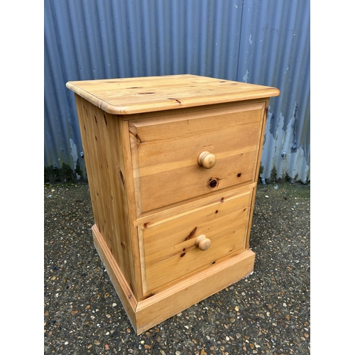 104 - A pine two drawer filing cabinet 54x54x77