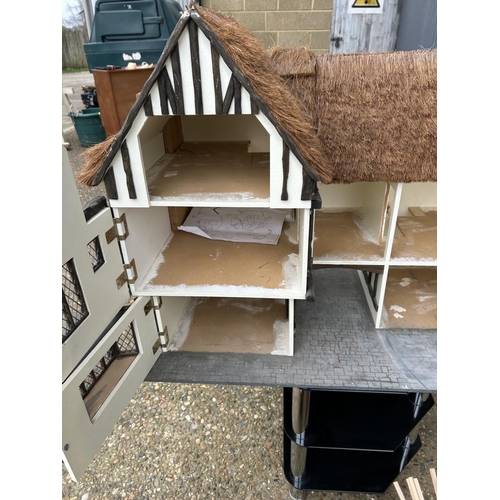 115 - A very large Tudor style dolls house with further bits  107x53x80