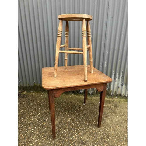 117 - An oak country table and a stool