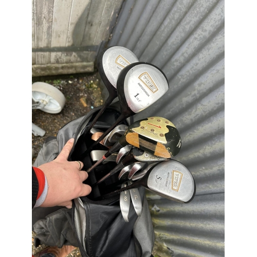 126 - A bag of Wilson gold clubs, bag of viper clubs, two aluminium golf trollies and box of golf accessor... 