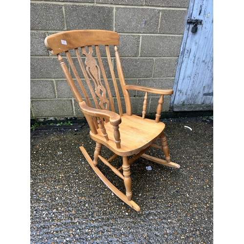 127 - A farmhouse style Windsor rocker chair