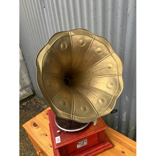 135 - A reproduction HMV wind up gramophone