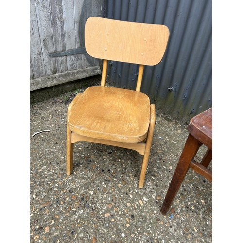 16 - A bent ply chair and a pair of vintage school chairs