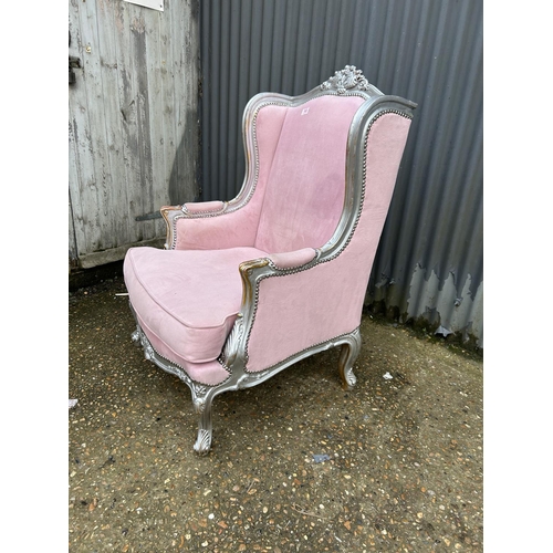 160 - A silver gilt framed armchair with pink upholstery