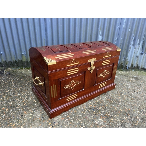 163 - A brass inlaid dome top trunk with inner tray 77x40x50