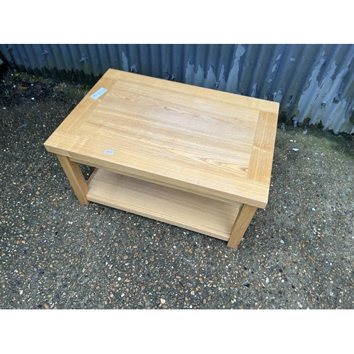 165 - A modern light oak coffee table 91x60x50