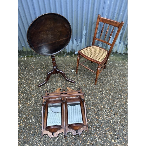 170 - A circular snap top table, rosewood inlaid wall mirror and bergere seated chair