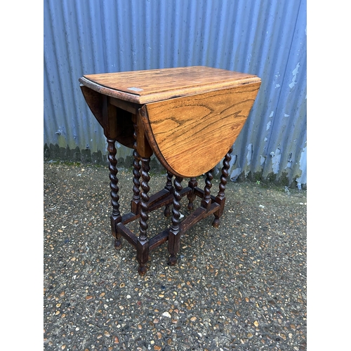 171 - An oak barley twist gate leg table
