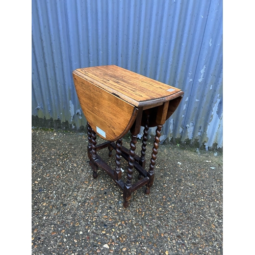 171 - An oak barley twist gate leg table