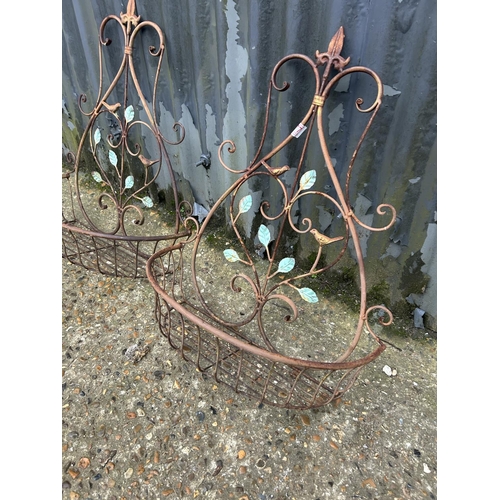 177 - A pair of french metal work wall baskets. 60h w49