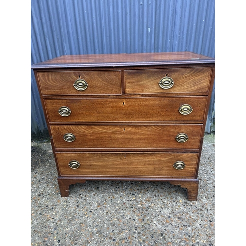 184 - A mahogany chest of five drawers (cut to two sections)  103 x 53 x 98 cms