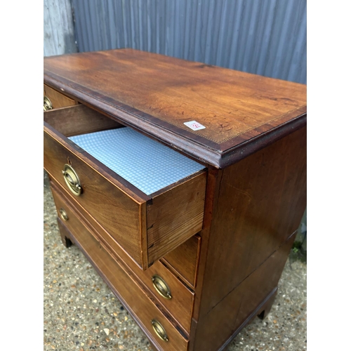 184 - A mahogany chest of five drawers (cut to two sections)  103 x 53 x 98 cms