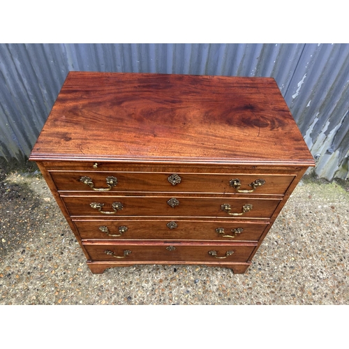 187 - Georgian mahogany bachelors chest of four drawers with brushing slide 78 x 45 x 84 cms