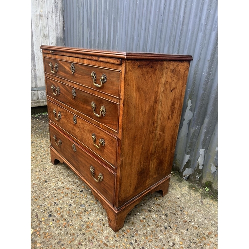 187 - Georgian mahogany bachelors chest of four drawers with brushing slide 78 x 45 x 84 cms