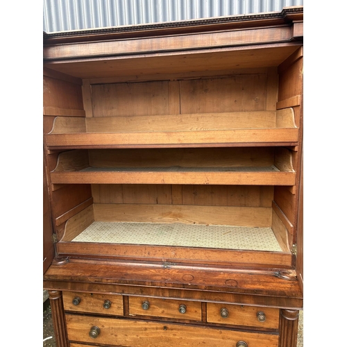 198 - William lV mahogany linen press fitted with three slides and five drawer base,  width 136 x depth of... 