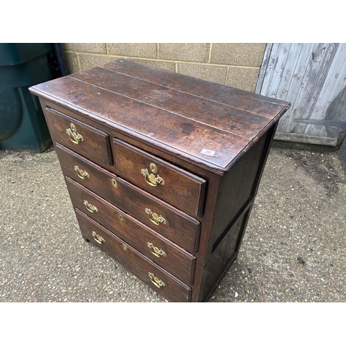 20 - An 18th century oak two section chest of five drawers, with secret compartments 95 x56 x 112