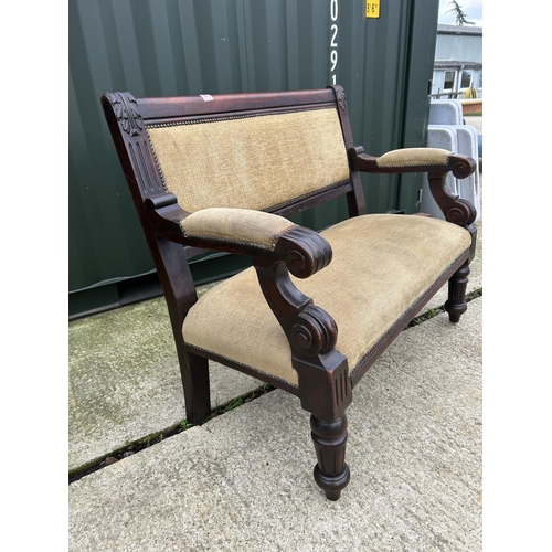 260 - A mahogany framed settle bench seat with gold upholstery 118cm wide