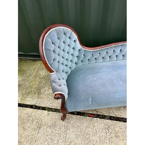 261 - A Victorian style mahogany, blue upholstered chaise longue