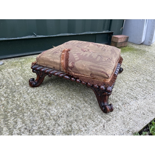 263 - A small carved mahogany ornate Victorian footstool marked LES EDWARDS Oxford street