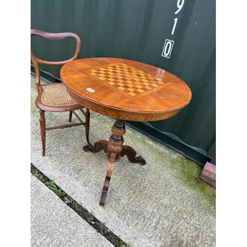 264 - A Victorian mahogany games table with satinwood inlaid chequer board top together with a mahogany ch... 