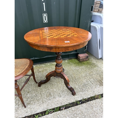 264 - A Victorian mahogany games table with satinwood inlaid chequer board top together with a mahogany ch... 