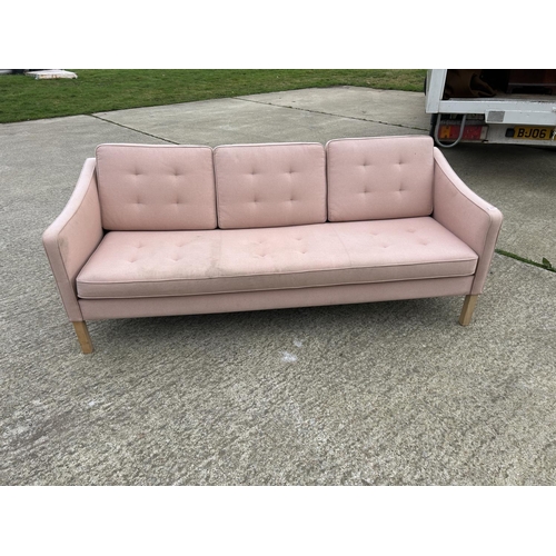 268 - A DANISH STYLE pale pink three seater sofa